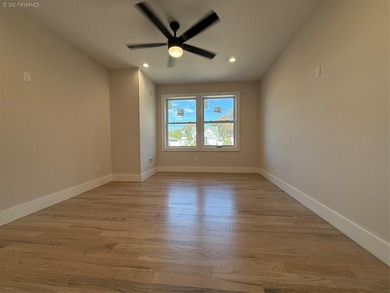 Brand-new custom Cape Cod home offering East End living with a - photo 10