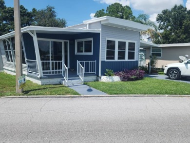 Lake Home For Sale in Pinellas Park, Florida