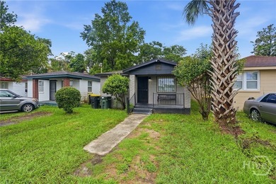 This well-maintained 3-bedroom, 1-bath block home offers - photo 3