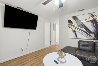 This well-maintained 3-bedroom, 1-bath block home offers - photo 8