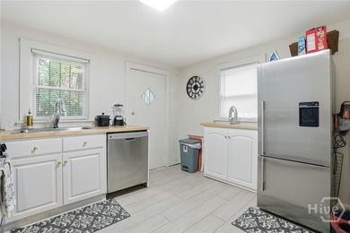 This well-maintained 3-bedroom, 1-bath block home offers - photo 10