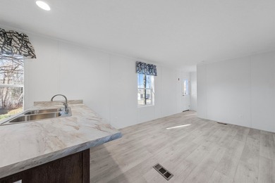 CONVENIENTLY LOCATED, COZY AND AFFORDABLE NEW HOME. Featuring an - photo 5