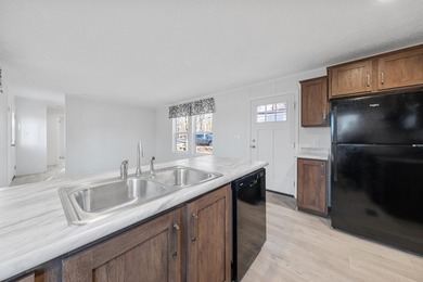 CONVENIENTLY LOCATED, COZY AND AFFORDABLE NEW HOME. Featuring an - photo 6
