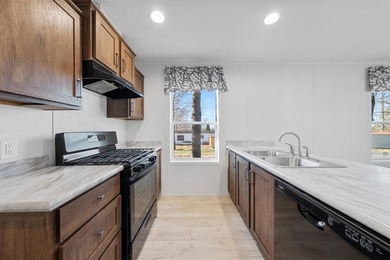 CONVENIENTLY LOCATED, COZY AND AFFORDABLE NEW HOME. Featuring an - photo 8