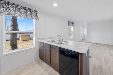 CONVENIENTLY LOCATED, COZY AND AFFORDABLE NEW HOME. Featuring an - photo 10