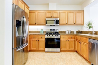 RARE DUAL PRIMARY LAYOUT! Welcome to effortless luxury living in - photo 8