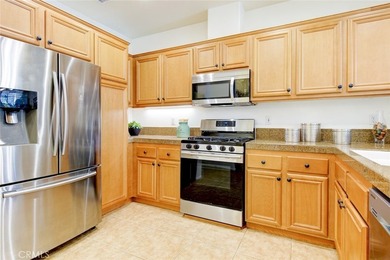 RARE DUAL PRIMARY LAYOUT! Welcome to effortless luxury living in - photo 9