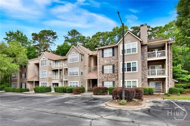 Experience resort-style living in this top-floor, 2-bedroom - photo 1