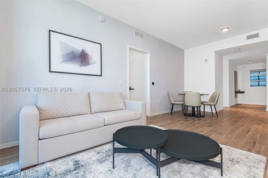 Breathtaking high-floor coastal living awaits in the heart of - photo 3