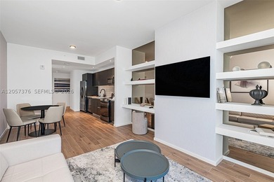 Breathtaking high-floor coastal living awaits in the heart of - photo 8