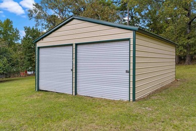 Three lots and a spacious 26x20 metal shop with three roll-up - photo 7