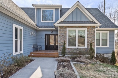 Nestled in the serene, gated community of Fox Lair Crossings and - photo 1