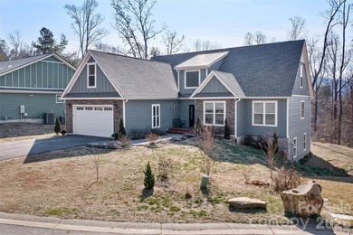 Nestled in the serene, gated community of Fox Lair Crossings and - photo 3