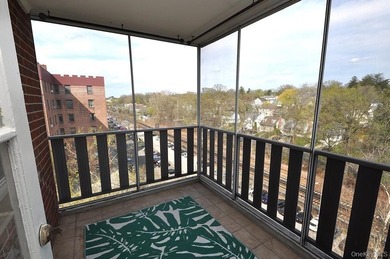 Perched on the top-floor corner, this sun-drenched 2-bedroom - photo 11