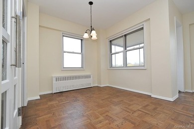 Perched on the top-floor corner, this sun-drenched 2-bedroom - photo 19