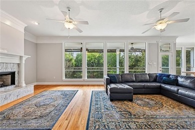 Charming and beautifully updated, this Old Mandeville gem is