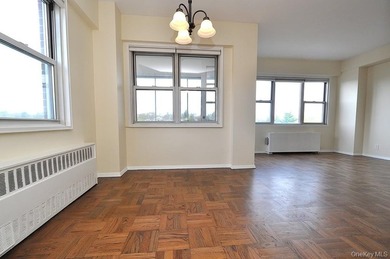 Perched on the top-floor corner, this sun-drenched 2-bedroom - photo 21