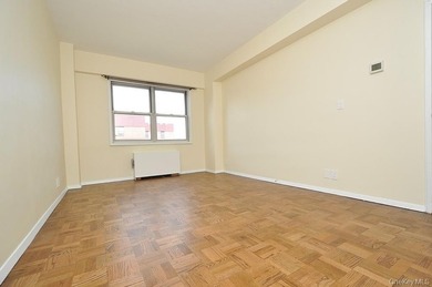 Perched on the top-floor corner, this sun-drenched 2-bedroom - photo 24
