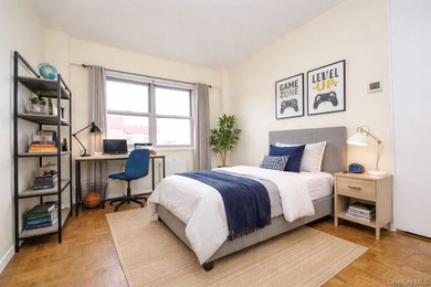 Perched on the top-floor corner, this sun-drenched 2-bedroom - photo 28