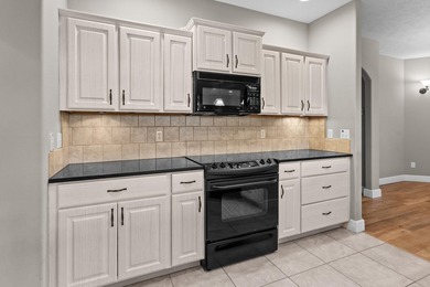 Experience refined living in the highly sought-after gated golf - photo 17