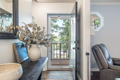Discover tranquility in this charming lake home nestled in the - photo 6