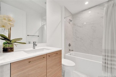 Experience elevated waterfront living in this beautifully - photo 30