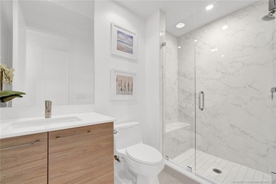 Experience elevated waterfront living in this beautifully - photo 32