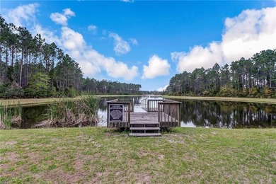 uild your dream home on this beautiful wooded lot in the gated - photo 5