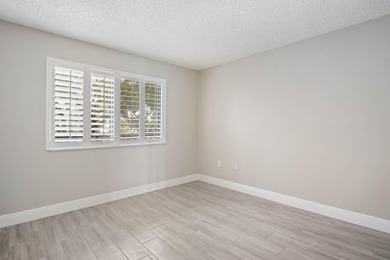 Beautiful 1-bedroom condo featuring updated flooring and a - photo 11