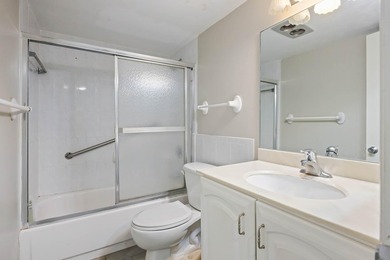 Beautiful 1-bedroom condo featuring updated flooring and a - photo 13