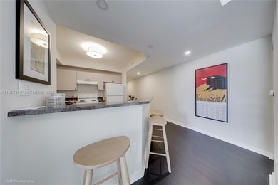 Centrally located one-bedroom, one-bath condo just steps from