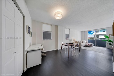 Centrally located one-bedroom, one-bath condo just steps from