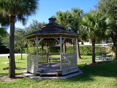 Beautiful 4/3/2 Key West style home in the gated Magnolia Lakes - photo 52