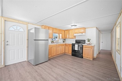 Recently revamped and situated on approximately half an acre - photo 11