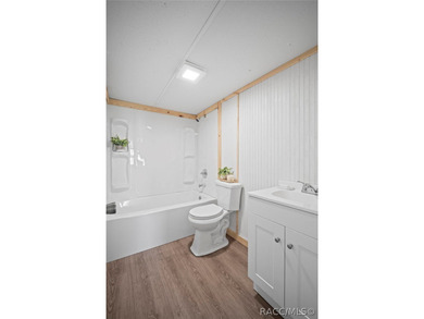 Recently revamped and situated on approximately half an acre - photo 21