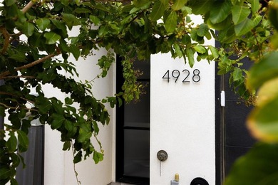 Experience elevated living in this stunning 4-story luxury