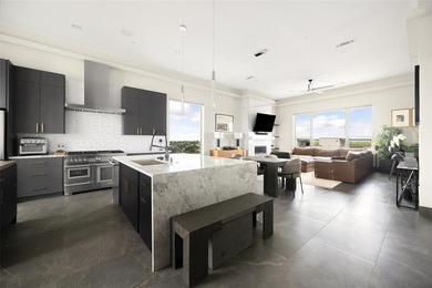 Experience elevated living in this stunning 4-story luxury