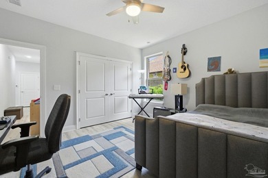 Welcome to this stunning custom-built home located in the gated - photo 33