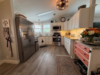 THIS HOME IS ON LEASED LAND WITH AN APPROXIMATE MONTHLY LOT - photo 44