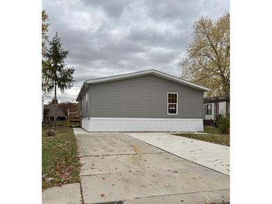 Detroit River Home For Sale in Trenton Michigan