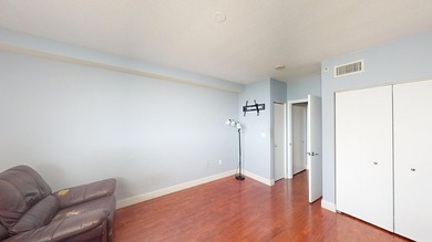This 12th-floor unit in The Slade offers breathtaking views of - photo 12