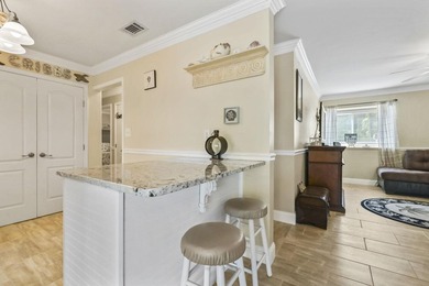 Experience easy coastal living in this beautifully updated - photo 13
