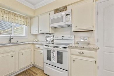 Experience easy coastal living in this beautifully updated - photo 16