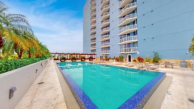 This 12th-floor unit in The Slade offers breathtaking views of - photo 22