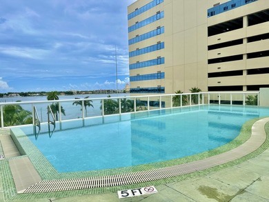 This 12th-floor unit in The Slade offers breathtaking views of - photo 32