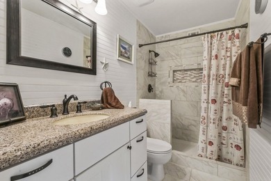 Experience easy coastal living in this beautifully updated - photo 33