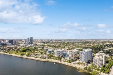 This 12th-floor unit in The Slade offers breathtaking views of - photo 36