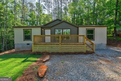 Lake Home For Sale in Eatonton, Georgia
