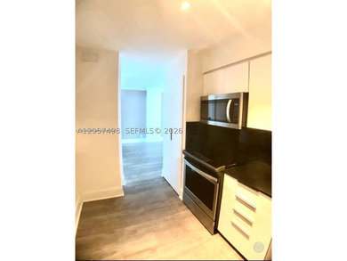 COMPLETELY REMODELED PENTHOUSE WITH STUNNING OCEAN AND CITY - photo 3