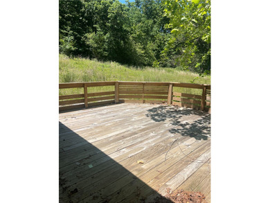 Charming 3-Bedroom home on 3 Acres - Lake Sequoyah Area! Nestled - photo 17